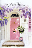 At first glance, this Crystal Palace doorway looks like the beginning of a story about moving in and starting fresh. A soft, blush-pink door stands at the centre, the paint smooth and inviting, framed by calm, whitewashed walls and a neatly painted shutter that add to the gentle, clean feel of the entrance. Draped across the top and down the sides, wisteria cascades in loose, trailing strands of lavender and pale purple, its blossoms hanging in clusters that create the impression of a natural floral curtain, similar to the trailing vines you might notice around the quieter streets off Gipsy Hill. Below this canopy of blooms, on the step right by the threshold, a simple grey tin bucket has been placed with intention. From it rises a lush bouquet of white and cream roses, their rounded petals soft and full, arranged so the flowers appear to nestle into one another, supported by sprigs of delicate green foliage that spill out in gentle arcs. A soft pink ribbon wraps the base of the bucket, its bow a small echo of the door's colour, tying the scene together visually and emotionally. The light appears to be late afternoon, casting a warm, golden tone and subtle shadows of wisteria clusters along the ground, making the entry feel sheltered and welcoming. The mood is quietly joyful, as if a local florist has just delivered a housewarming arrangement for new homeowners unlocking their door for the first time, filling this Crystal Palace home with the scent of roses, the sweetness of wisteria, and the tender promise of welcome home.